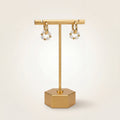 Cercle gold hoops shown as a pair, each with a looped strand of pearls and gold beads